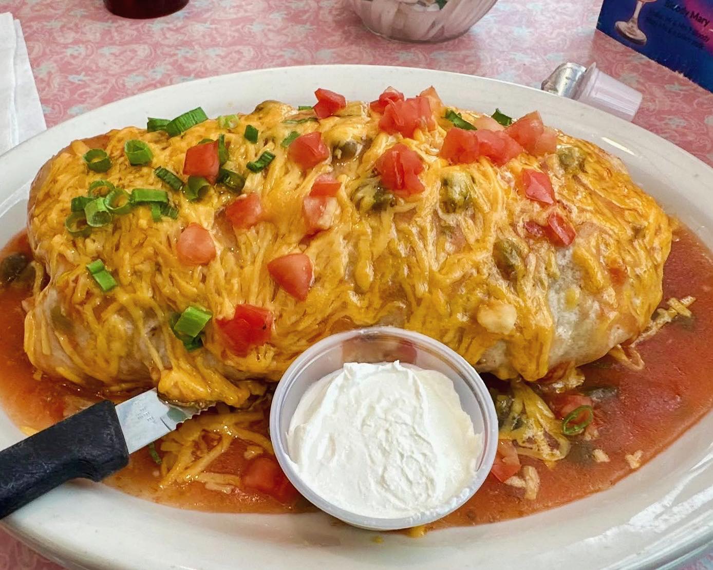 Smothered breakfast burrito with green chili